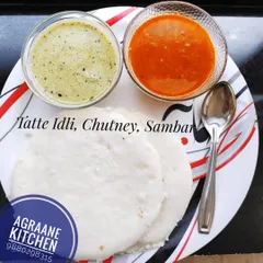 Celebrating World Idli Day with my special Thatte Idli. These large, soft, and fluffy idlis are a favorite and are served with my signature sambar and chutney.