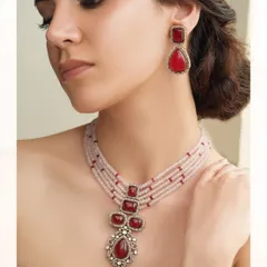 A vibrant red version of our beaded necklace set, perfect for making a bold and colorful statement at any festive event.