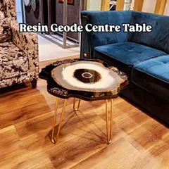 Looking for the perfect center table? This resin geode table with its black, white, and crystal design is sure to elevate your space.