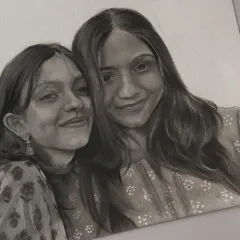 A finished A4 portrait of two friends or sisters. Capturing shared smiles and creating a memory they can share is always a pleasure.