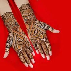 A bold and beautiful design featuring large peacock motifs with intricate feather details, combined with floral patterns.