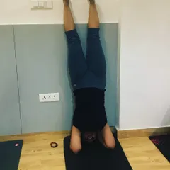 Using the wall is a safe and effective way to learn inversions like Sirsasana, or headstand. I guide beginners through these foundational steps to ensure they build their practice with proper alignment and without fear.