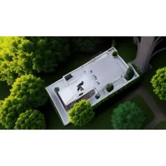 The 'After' shot of a landscaping project. This top-down view clearly shows the finished design with lush green trees and a clean, white rooftop area.