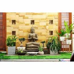 Creating a serene meditation corner for a client in Mysore. I used a combination of artificial turf, a central Buddha statue, and a curated selection of indoor plants like bonsai and ferns to design this tranquil space.
