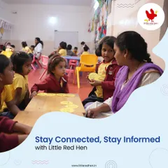 A teacher interacts with a small group of students, highlighting our commitment to keeping parents connected and informed. We provide regular progress reports to share every milestone with you.