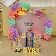 A unicorn theme is always a favorite for kids. I can create a complete magical world with pastel rainbow balloon arches, unicorn cutouts, themed pedestals, and light-up letters for the birthday girl's name.
