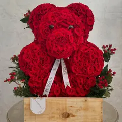 I create more than just bouquets; I sculpt with flowers. This is Valentino, my floral teddy bear, meticulously crafted from hundreds of fresh red roses. It's a unique and romantic gesture for proposals, anniversaries, or a grand declaration of love.