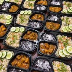 This is how my food reaches you. Here is a Veg Pulao with fish curry and a side of black rice pudding (Chak-hao Kheer), all packed fresh and hot in a convenient meal tray.