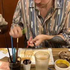 A snapshot from one of my coffee painting workshops in Bangalore. It's wonderful to see people get absorbed in the creative process and discover a new way to make art.