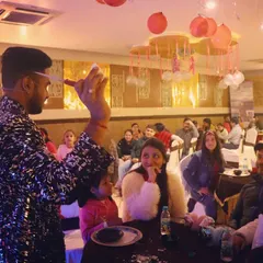 Performing for an intimate birthday dinner, I'm captivating the guests right at their table. Even in a restaurant setting, I can create a personalized show that amazes both kids and adults.