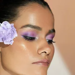 Adding a flower that matches the eyeshadow color emphasizes the inspiration behind the look. This shows how we can draw from anything to create something beautiful.