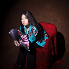 Not so cold but definitely too hot... just talking about coffee. A moody and stylish portrait with a pop of color from the printed shirt.