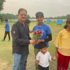 Celebrations are a team effort. After a successful tournament, we celebrate with cakes, flowers, and the entire club community, including players, coaches, and parents.