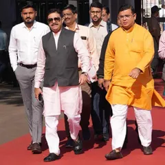 A leader's outfit reflects his personality. Politician Prasad Lad trusts me to create clothing that showcases confidence, seen here in a custom pink kurta and black Nehru jacket.