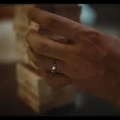 A close-up shot focusing on Rajkummar Rao's hand and the Tanishq ring. In jewelry campaigns, every detail counts, and the styling must complement without distracting from the product.