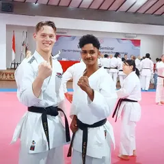 Making new friends on the international stage. Here I am with another black belt competitor at the Shitoryu Karatedo International Championships.