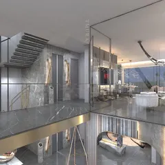 This duplex living area is connected by a floating staircase, creating a visual link between two levels. We used polished marble flooring and reflective surfaces to enhance the sense of space and light, crafting a cohesive and luxurious environment.