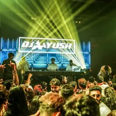 On stage with my name in lights. Playing for a crowd this big requires a powerful setup and a playlist that connects with everyone.