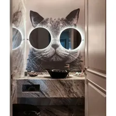 Who said powder rooms have to be boring? I love creating dramatic, memorable spaces that surprise and delight. This "Meow" bathroom, with its custom cat wallpaper and illuminated mirror glasses, is a perfect selfie spot and a testament to my belief that every corner of a home should have personality.
