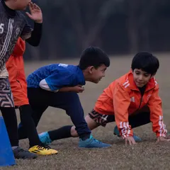 Ready, set, go. The friendly competition in our warm-up drills brings out the best in the kids, fostering a sense of excitement and camaraderie right from the start.