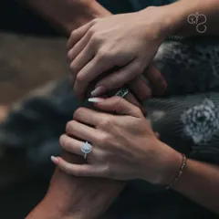 Two hearts, one journey, a lifetime of love. This image of intertwined hands represents the strong and supportive partnership I help my clients build.