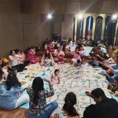 A wide view of our class circle, filled with families making music together. This setup ensures everyone feels included and can interact easily during our sessions in Kandivali and Goregaon.