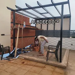 The construction continues, with more of the terracotta jali wall being carefully put into place. This behind-the-scenes look shows the hands-on work and attention to detail that goes into every project.