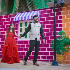 Having fun with colorful and quirky backdrops. This studio set is perfect for couples who want a playful and vibrant pre-wedding shoot.