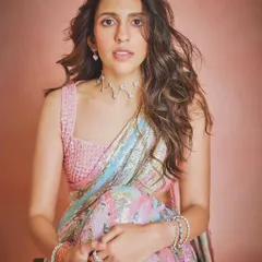 This multi-colored sequin saree by Manish Malhotra is all about fun and glamour. The pastel rainbow hues make it a perfect outfit for a sangeet or a festive party.