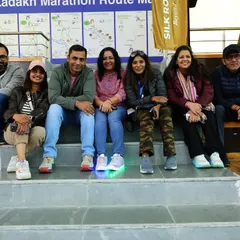 Our group relaxing at the marathon expo before the big race. The anticipation and team spirit are high.