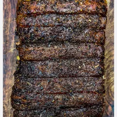This is my Herbs Crusted Karnivore Ribs. I marinate a premium rack of pork ribs overnight in a signature mix of Italian herbs and desi spices, then grill it to a tender and juicy finish.