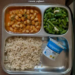 This plate of brown rice, fresh rajma curry, sautéed beans, and Greek yogurt shows a typical healthy meal. Moderation is key, and a sustainable diet is the best diet for you.