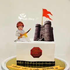 A square cake for a 'Halfway to One' celebration with a Shiv Jayanti theme. It's a wonderful way to introduce little ones to our heritage.