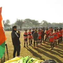 A coach addresses the players during our Republic Day event, speaking about the spirit of the game and the nation.