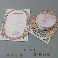 A truly unique invitation with a circular, multi-page insert set inside a floral laser-cut frame. The couple's names are also laser-cut, making this a very special design.
