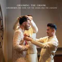 Grooming the groom with his best men. This candid shot captures the fun and camaraderie of getting ready. The groomsmen, in coordinated cream and gold outfits, help the groom with his final touches, showcasing how we style the entire groom's party for a cohesive look.