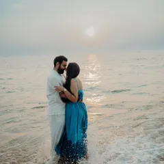 This is one of those moments that makes me love what I do. Just before sunset in Goa, with the waves washing over them, this sweet couple was completely lost in their own world. My documentary approach means I wait for these real, unscripted connections to happen, creating a timeless memory of their love during this natural light couple shoot.
