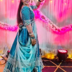 Another shot of my lovely client in the teal blue lehenga, smiling and enjoying her celebration.