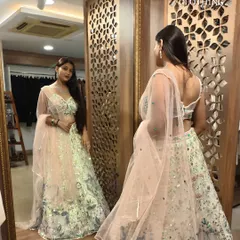 Admiring the reflection. The back of this lehenga is just as beautiful as the front.