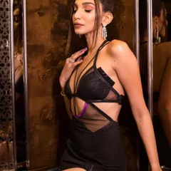 The sleek top knot I created for Juhi Godambe was the perfect hairstyle for her edgy, modern dress. It adds height and elegance, letting the outfit's details stand out.