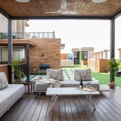 The lounge area under the pergola is designed for comfort. I used durable outdoor fabrics, a ceiling fan for air circulation, and a mix of seating options, including a swing chair, to create a relaxed, resort-like feel.