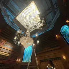 For this television commercial, we engineered a massive overhead rig featuring a Litegear Auroris with a custom 10x10 soft egg crate. The entire setup was suspended on motorized chain hoists, giving the director of photography complete control over this large, soft light source.
