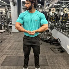 Flexing because progress looks good. Every rep, every drop of sweat is a step closer to the goal.