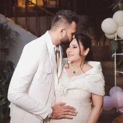 A tender moment between the parents-to-be. He gently kisses her forehead as they anticipate the arrival of their little one. These are the quiet, beautiful memories I love to help create.