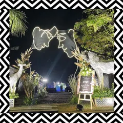 We created a unique and personal entrance for the sangeet night with this custom neon sign featuring the couple's faces. It's a modern, artistic touch that makes for a great welcome and photo spot.