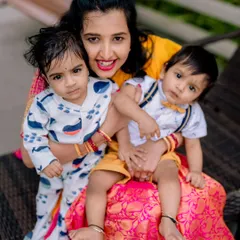 A real-life moment with mom and her two boys. Even when they won't smile for the camera, the result is an authentic and charming family photo.