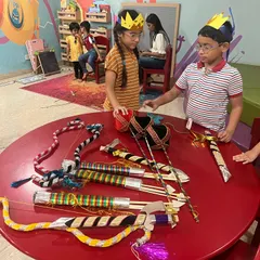 A close-up of our handmade props for the Ramleela. The children helped make these bows and arrows, learning about the story of Ram and Ravan as they crafted.