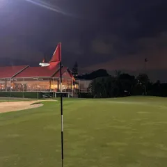 The clubhouse at Bangalore Golf Club lit up at night. The facilities provide a perfect place to relax and discuss the day's round after our session.