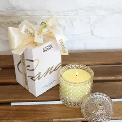A duplicate of ID 130, this image shows our signature Crystal Cove candle with its beautiful packaging, highlighting its appeal as a sophisticated and thoughtful gift.