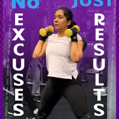 No Excuses, Just Results. A member demonstrates her strength and determination with dumbbell squats.